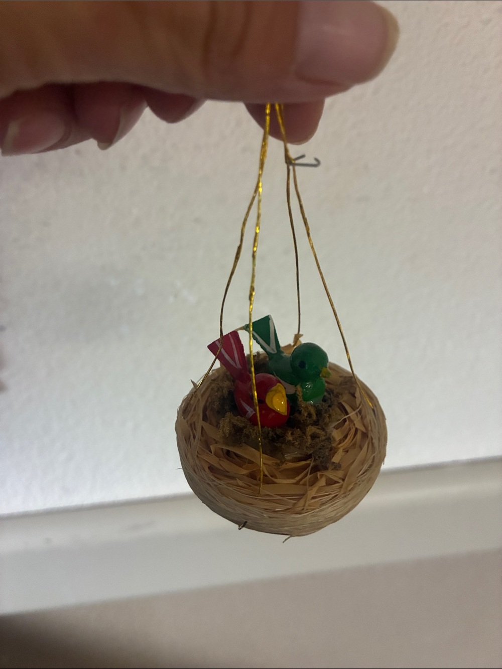 Baby birds in nest ornament